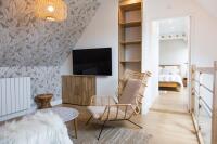 Le salon donnant sur la chambre Le salon donnant sur la chambre