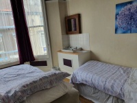 Room 5 Triple shared bathroom 1st floor Room 5 Triple shared bathroom 1st floor