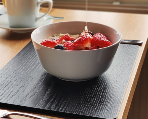 Porridge, with fresh fruit and drizzled with Exmoor Honey