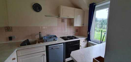Kitchen looking over the River Black Water and rear grounds