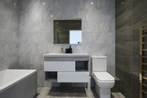 A fresh, well-maintained bathroom with essential amenities provided.