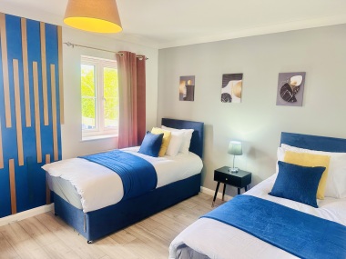 another photo of first bedroom, two beds can be zip linked to make it king size.