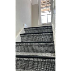 This photo represents the interior of the communal building stairs 