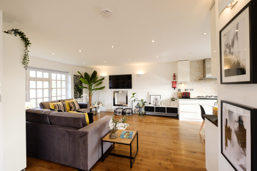 The stunning open-plan living/dining/kitchen area has large double aspect windows which flood the space with light. The sofa bed converts to a comfortable double bed for larger groups of guests.