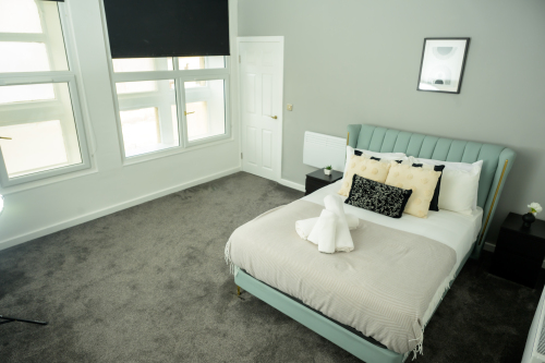 Your private retreat: a stylish double bedroom with a calm, welcoming feel.