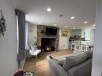 Smart tv with wood fired log burner