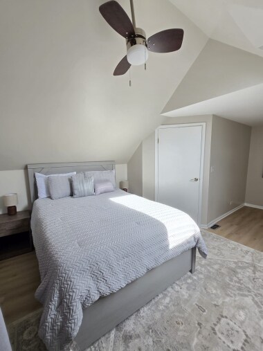 Unwind in this cozy and serene bedroom, featuring soft natural light, a plush bed, and stylish decor. The perfect retreat for a restful night’s sleep!