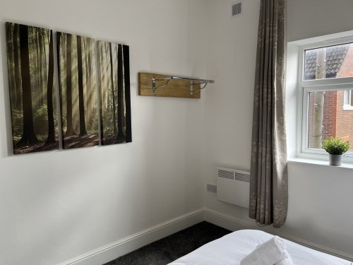 Studio 4 - Hanging rail with coat hangers provided for all your things