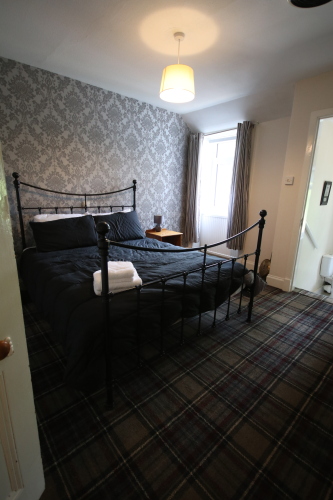 Main bedroom with window to the front