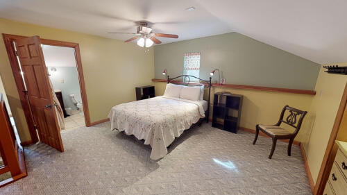 Loft bedroom with private bathroom and deck