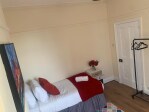 Spacious west facing bedroom with super king bed on the ground floor