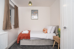 A bright, cosy single room offering a quiet space to relax and recharge.