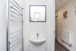 Convenient downstairs WC — clean, modern and easily accessible for added comfort during your stay.