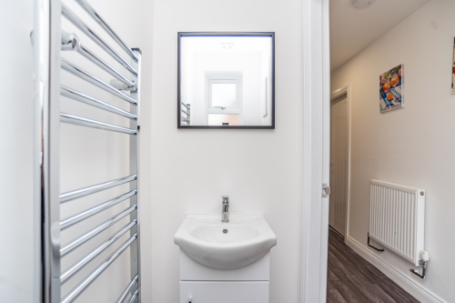 Convenient downstairs WC — clean, modern and easily accessible for added comfort during your stay.
