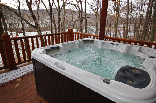 2-Person Hot Tub on Deck, with snowy field beyond