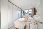 A serene bedroom offering comfort and modern elegance