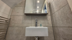 Designed with your comfort in mind, this stunning bathroom offers a spacious walk-in shower, heated towel rails, and beautiful finishes throughout. Located on the second floor, it serves the upper bedrooms with a touch of everyday luxury.