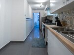 Brand new kitchen with utensils, new washing machine, fridge, microwave, oven, kettle, toaster, coffee, tea, sugar, milk