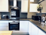 Beautiful fully equipped kitchen AIR CONDITIONING ready for cooking delicious family meals! All pots, pans, crockery, plates, bowls and cutlery you will need!