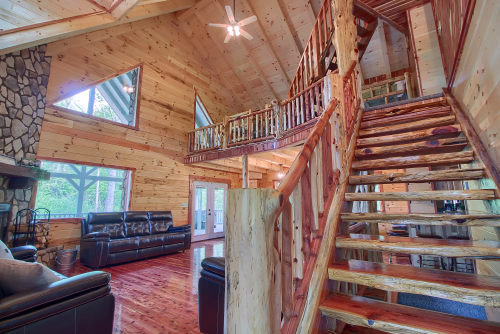 Cedar Staircase, leading to Open Loft, with Great Room to left, from Front Entrance, Main Level