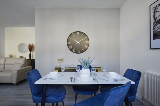 Enjoy meals together in this charming and well-set dining area.