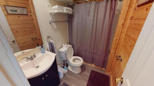 Down the hall and on the left you will come to the shared bathroom in the cabin
