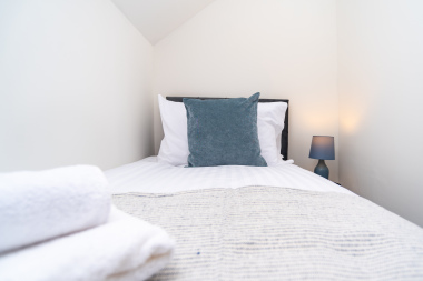 A clean, cosy room with a single bed - perfect for guests who prefer their own private sleeping space.