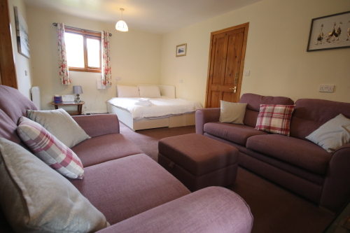 lounge with door to kitchen/diner