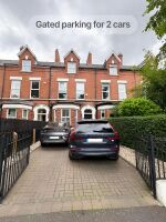 Gated parking for 2 large cars 