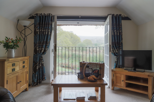 Hayloft Suite with it's own juliette balcony overlooking our garden