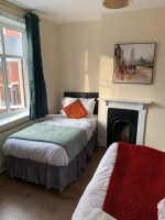 Spacious west facing bedroom with super king bed upstairs