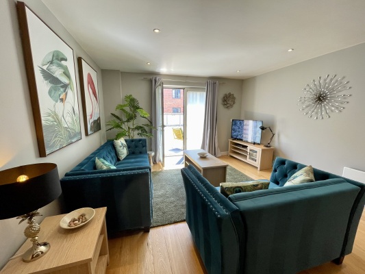 Comfortable lounge with flatscreen TV