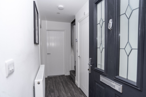 A tidy, inviting entrance that sets the tone for a comfortable, well-kept stay.