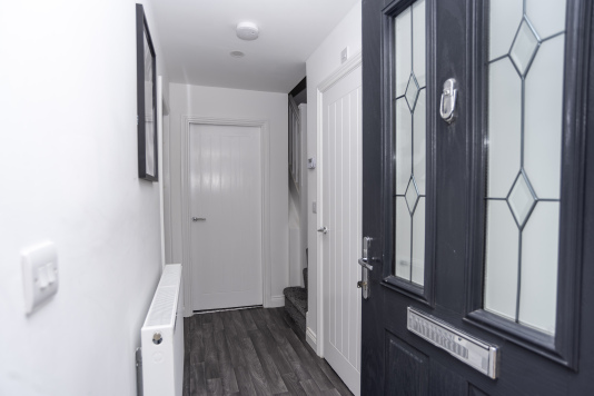 A tidy, inviting entrance that sets the tone for a comfortable, well-kept stay.