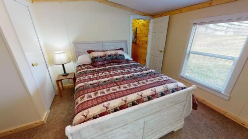 The Third bedroom in the cabin is the master bedroom