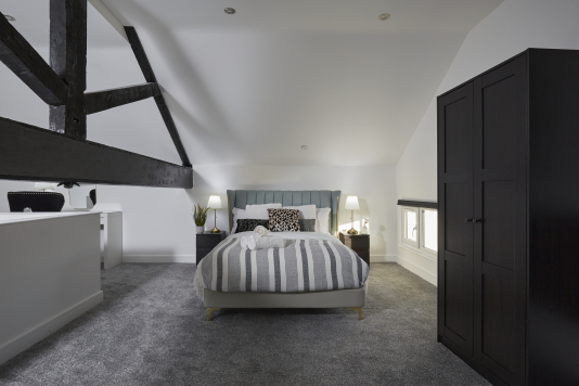 Relax and unwind in this cosy double bedroom, designed for a peaceful night’s sleep.