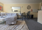 Stylish dining for four, complemented by modern Smart TV entertainment.