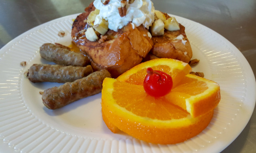 Stuffed French toast drizzled with an orange almond apricot glaze