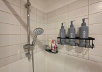 Bath, shower, and complimentary essentials included.