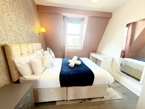 This photo represents bedroom 3 inside the property