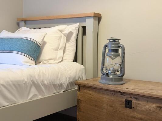 Old lantern adding character to the bedroom