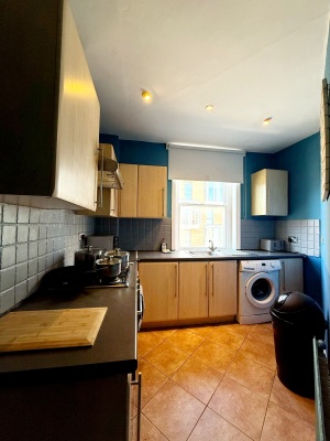 This photo represents the kitchen of the flat