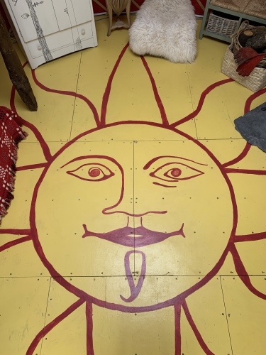 Cai Yurt's hand-painted sun floor