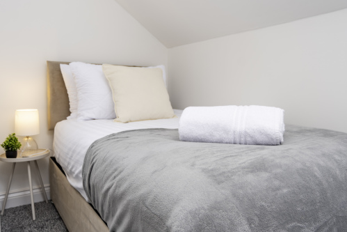 Top-floor bedroom with single bed (one of two singles in this room)