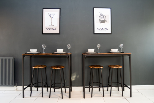 Twin breakfast bars positioned side by side, offering a comfortable and flexible dining space.