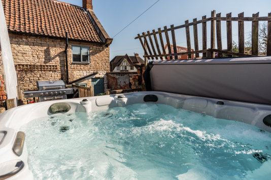 Hot Tub Views of the house and BBQ Area