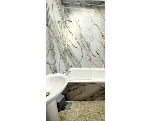 This photo represents the communal bathroom