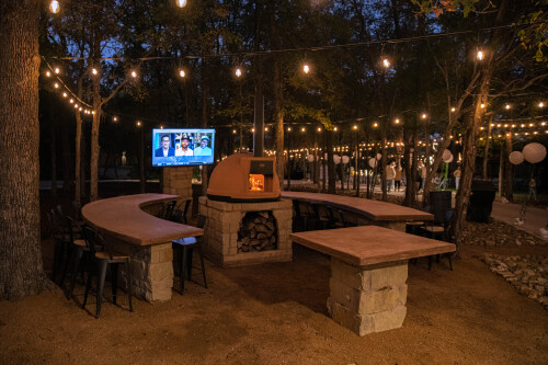 Wood Fire Pizza Oven and Meeting Area with 70 inch TV and Surround Sound
