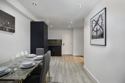 Well-appointed kitchen with essential appliances and ample workspa