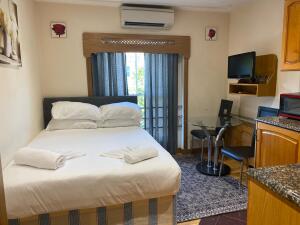 Picture represents the type Studio Deluxe Private Bathroom. It might not be exactly the same as per booking. All same type of apartments are allocated subject to availability per booking